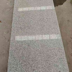 朔州芝麻白光面毛板